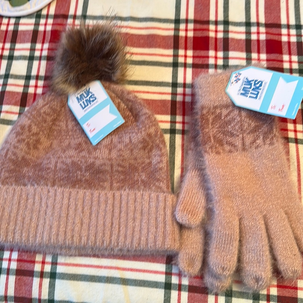 New with tags, muk luks gloves and matching hat